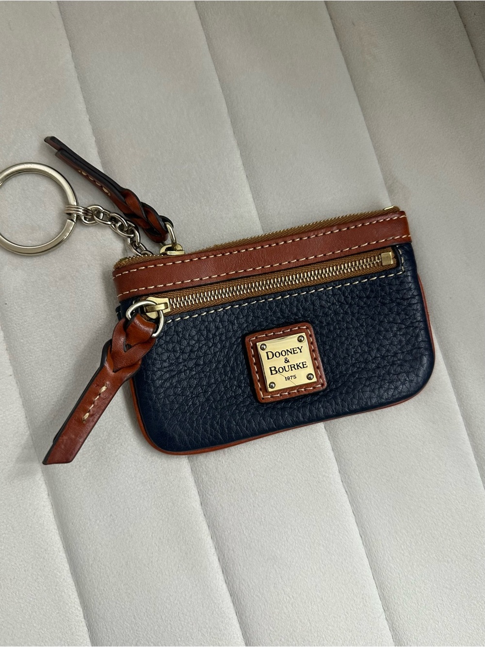 Dooney & Bourke Navy and Brown Pebbled Leather Key Pouch with Gold Hardware